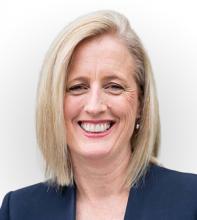 A portrait of a smiling Katy Gallagher Minister for the Public Service