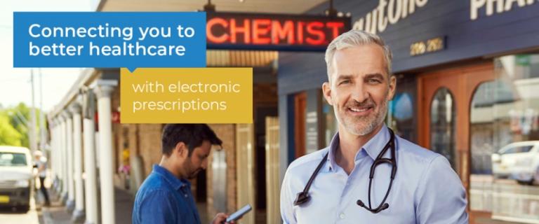 A man with a stethoscope around his neck stands in front of a chemist on a street. Behind him is another man walking past looking down at his mobile phone. Text overlaying the image reads ‘Connecting you to better healthcare’ ‘with electronic prescriptions’.