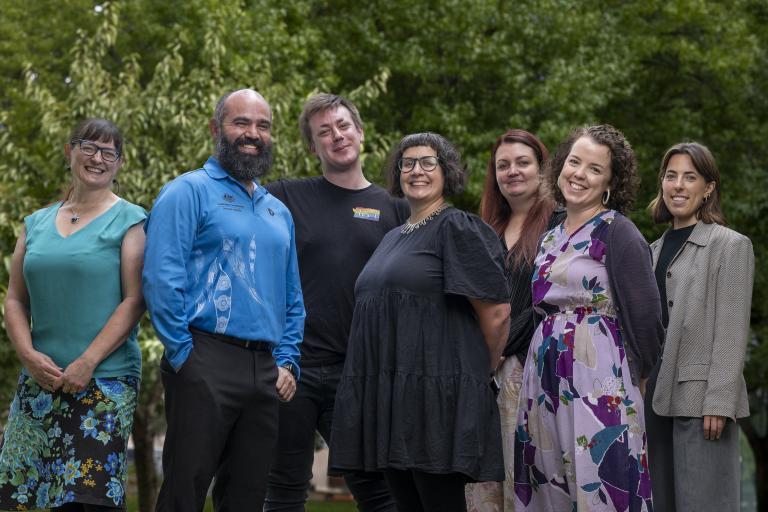 Photograph of a group of seven people representing the diverse staff of the Australian Public Service.