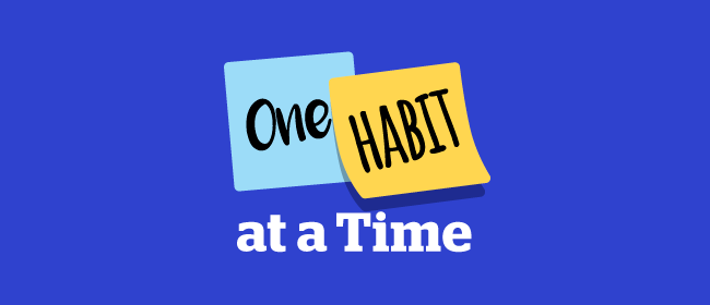 ‘one habit at a time’ on navy blue background