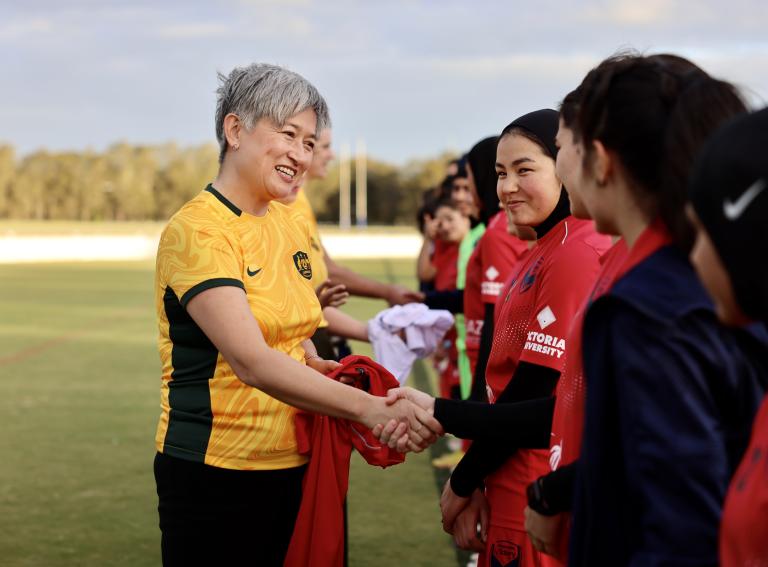 Foreign Minister Penny Wong greets members of the Afghan women’s football team at the FIFA Women’s World Cup Australia & New Zealand 2023.