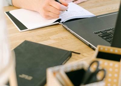 A stock image of somebody working at a desk