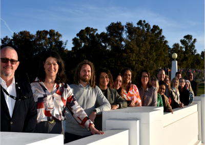 Collaboration Circle participants standing in a line outside smiling